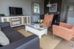 Chalet-15-woonkamer1-robbenjager-texel-2024-Hersteld.jpg