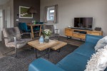 Chalet-12-woonkamer2-robbenjager-texel-2024-Hersteld.jpg