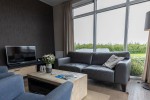 Chalet-13-woonkamer2-robbenjager-texel-2024-Hersteld.jpg