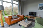 Chalet-14-woonkamer-robbenjager-texel-2024-Hersteld.jpg